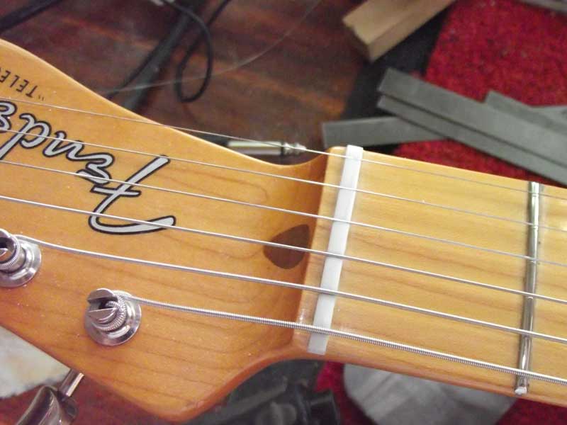 Completed nut with shallow slots