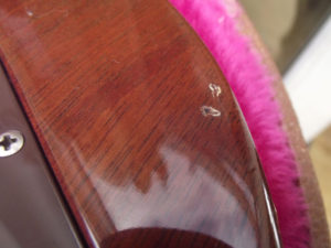 Dings to rear of Gibson Les Paul