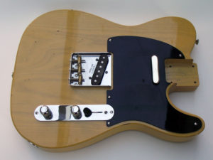 Butterscotch Telecaster body with hardware fitted