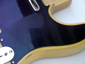 Close-up of the distressed pickguard