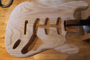 Sealer coat on Stratocaster body sanded and ready for colour