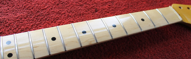 Completed neck showing polished frets