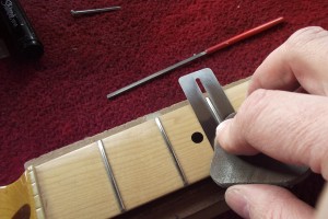 Removing scratches from the frets using Micromesh pads