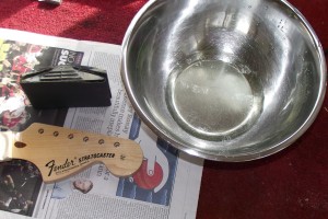 Use a sanding block, P400 paper and water with a bit of washing up liquid in it