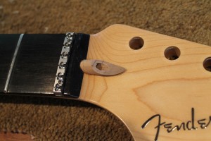 Test fit of new Fender USA walnut plug